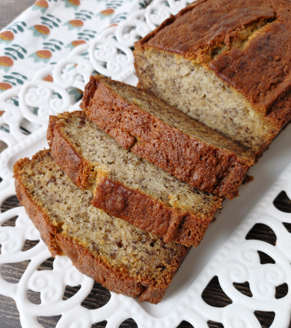 Sliced banana bread on a white plate